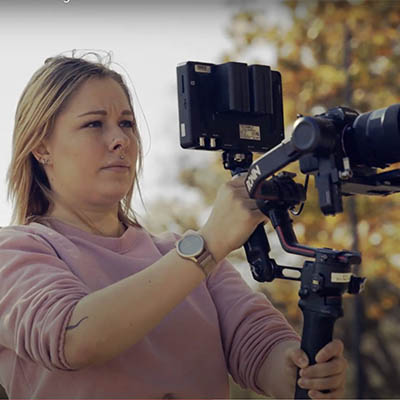 Mariah Rollwagen holding a video camera