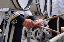 Close up on hands playing a snare drum.
