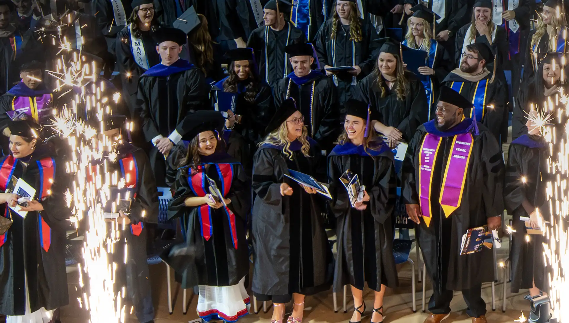 Washburn graduation ceremony with sparks