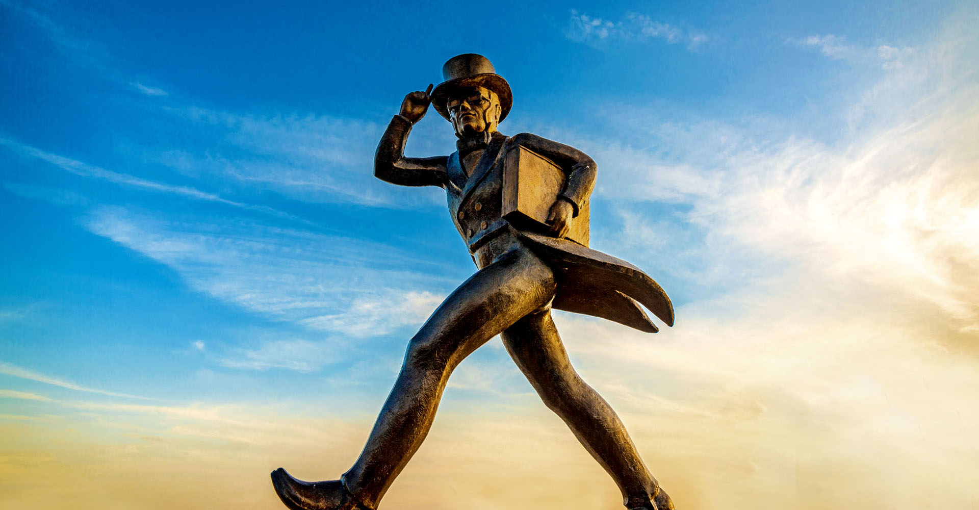 ichabod statue with sky background