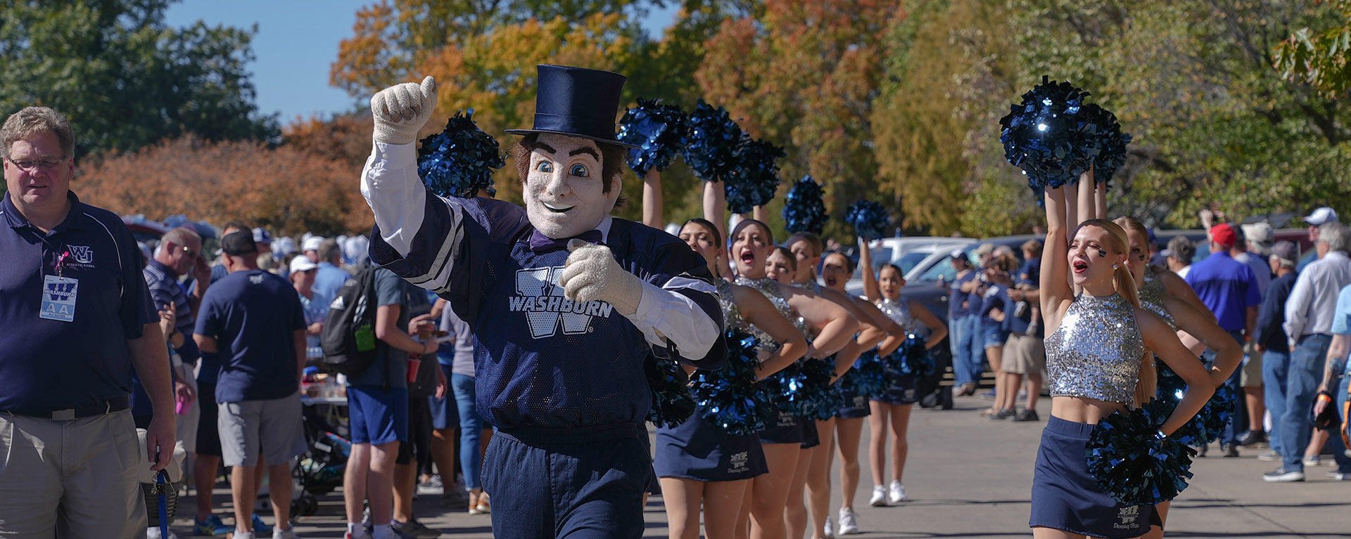 Mr. Ichabod and cheerleaders at a tailgate
