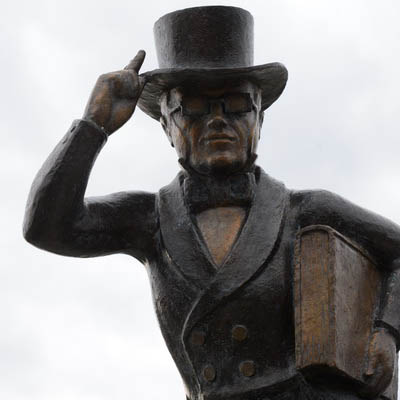 Ichabod statue with sky background