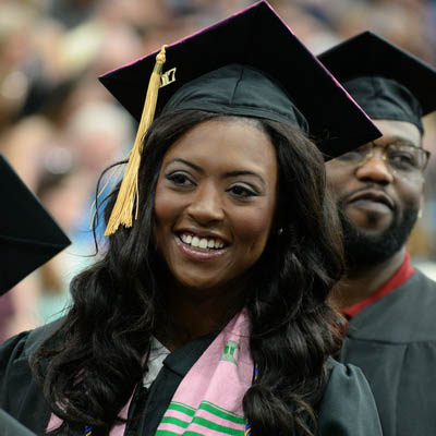 female graduating student smiling
