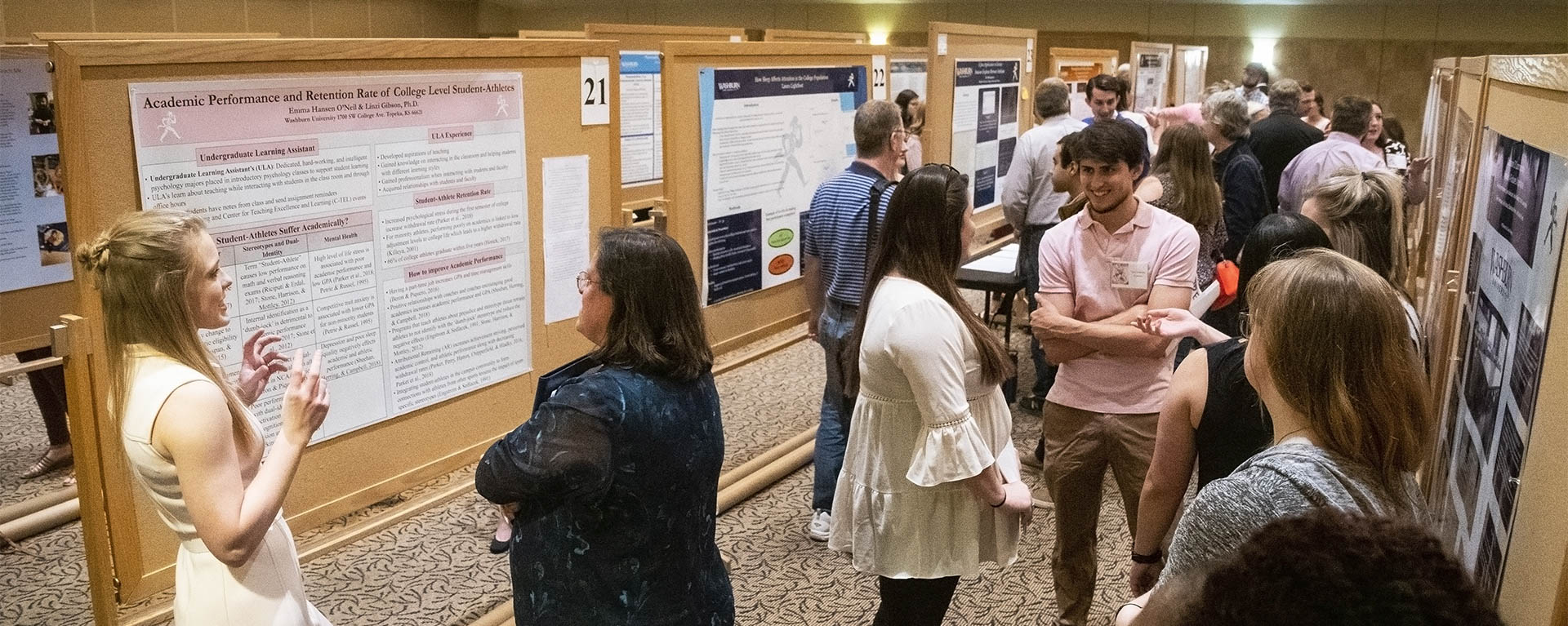 Students present their posters at Apeiron