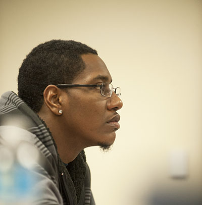 A Washburn student in the Welcome Center