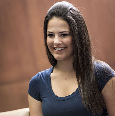 A student smiles during a luncheon in Welcome Week.