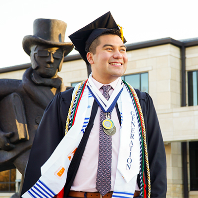 Brandon Moreno wearing graduation regalia