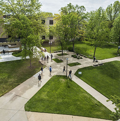 A view from above as students walk to class on a spring day.