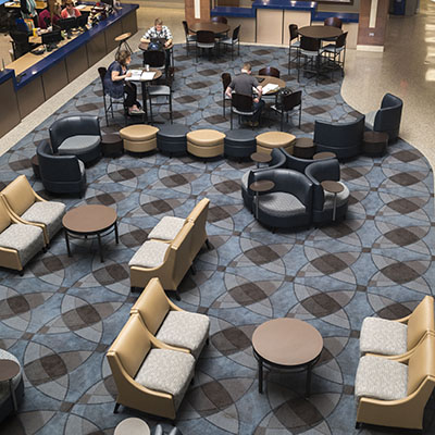 The Welcome Center lobby includes dozens of comfortable chairs and desk for students