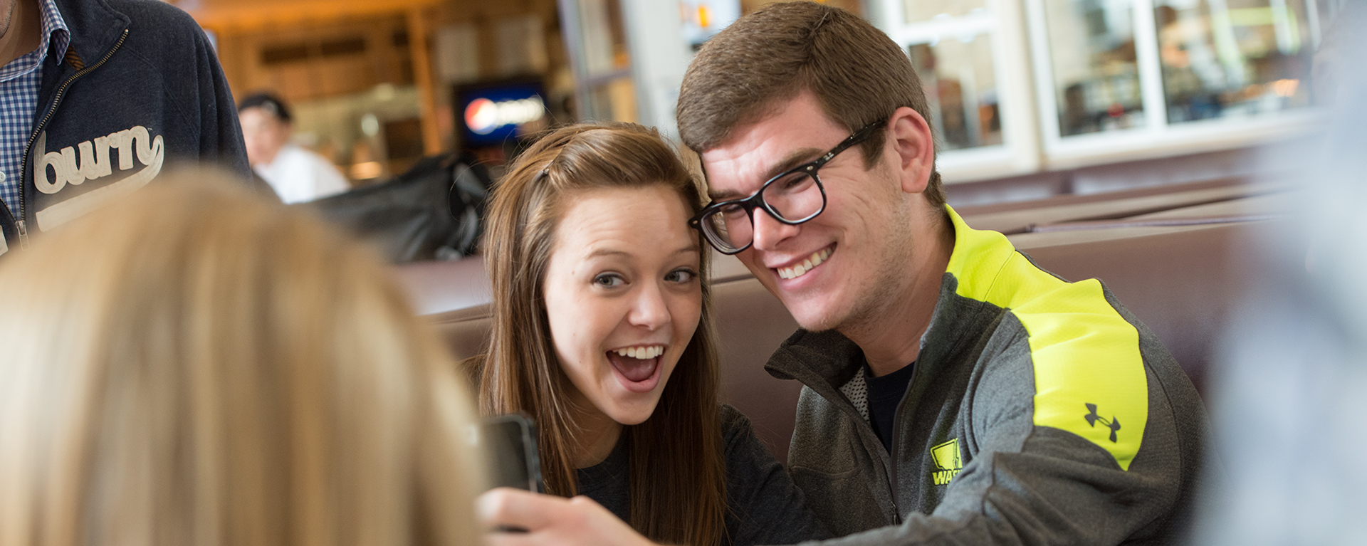 Washburn students take a selfie at the Union Market.