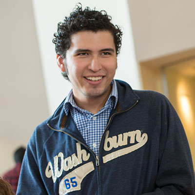 A Washburn student interacts with friends in the Union Market