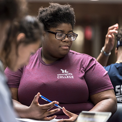 A Washburn student chats with friends in the Morgan Hall Welcome Center