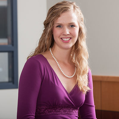 A Washburn student smiles while in Henderson Learning Center.