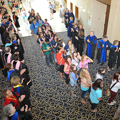 Another tradition at Washburn: Faculty form a tunnel to welcome students at Convocation