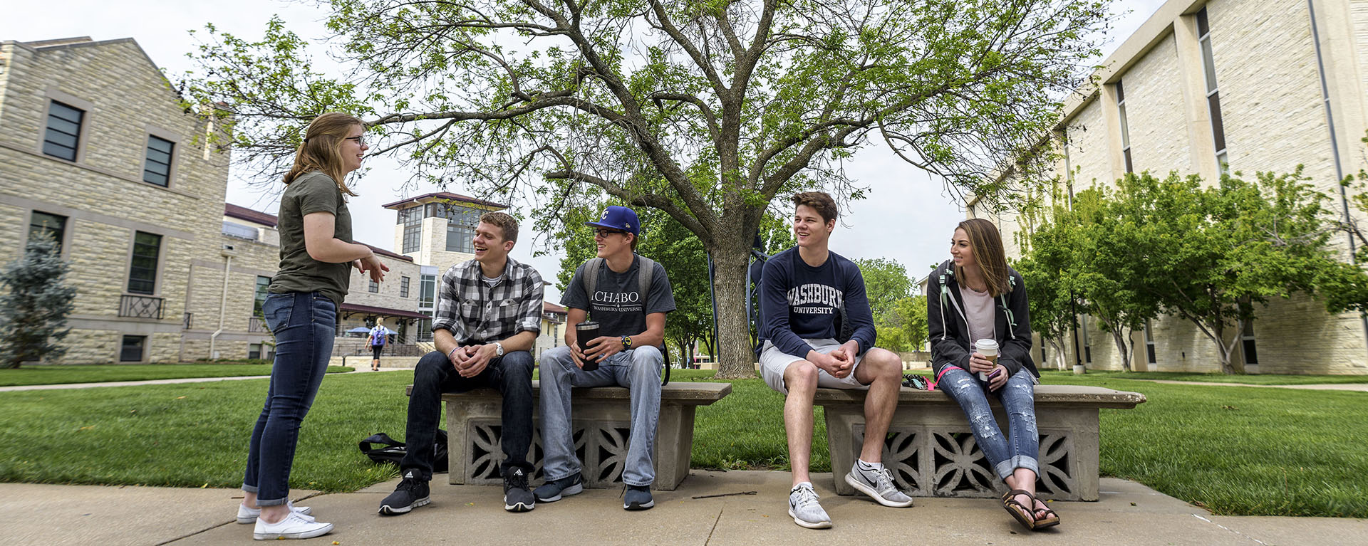 Washburn student ambassadors chat during a break on campus