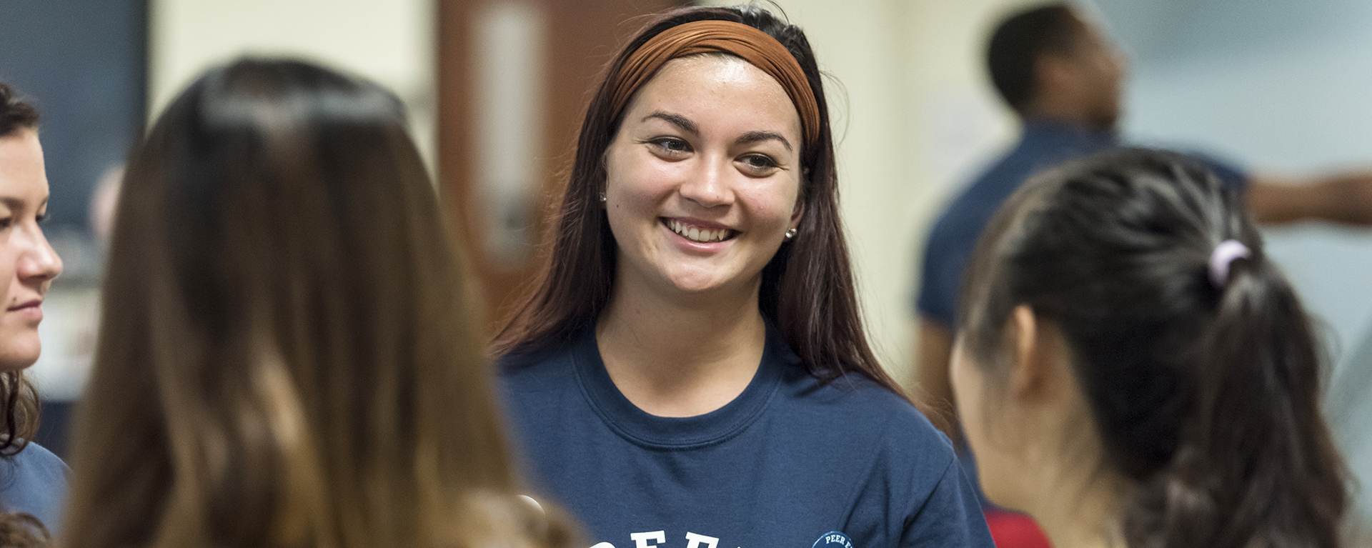 A peer educator speaks to fellow students during Welcome Week at Washburn