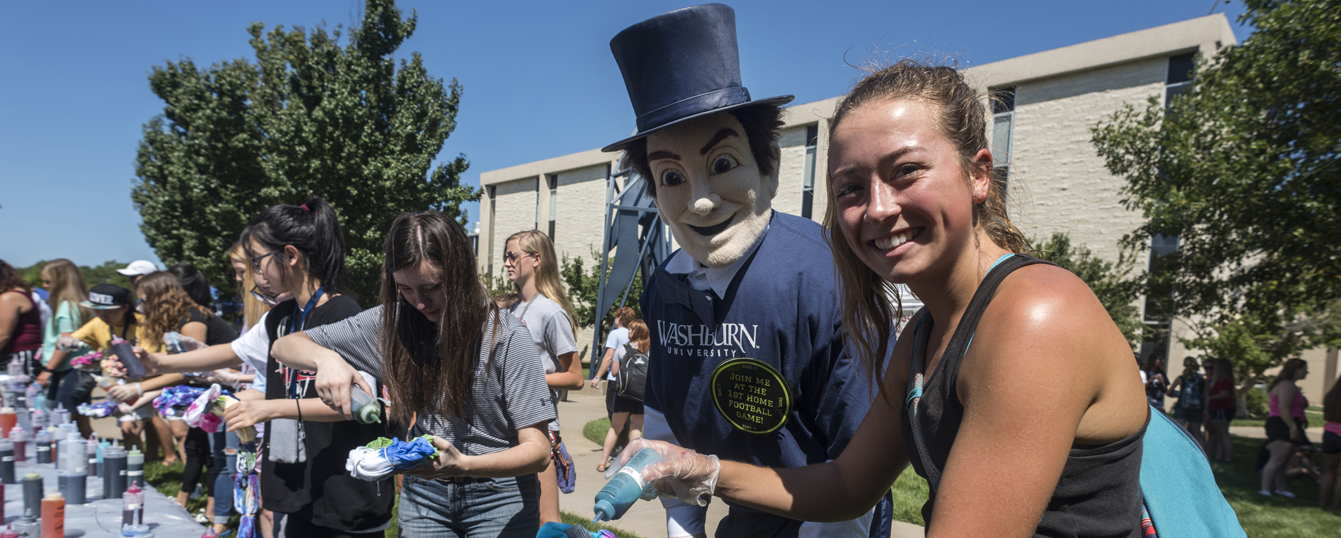A Washburn student during the first day of class with our mascot, Mr. Ichabod