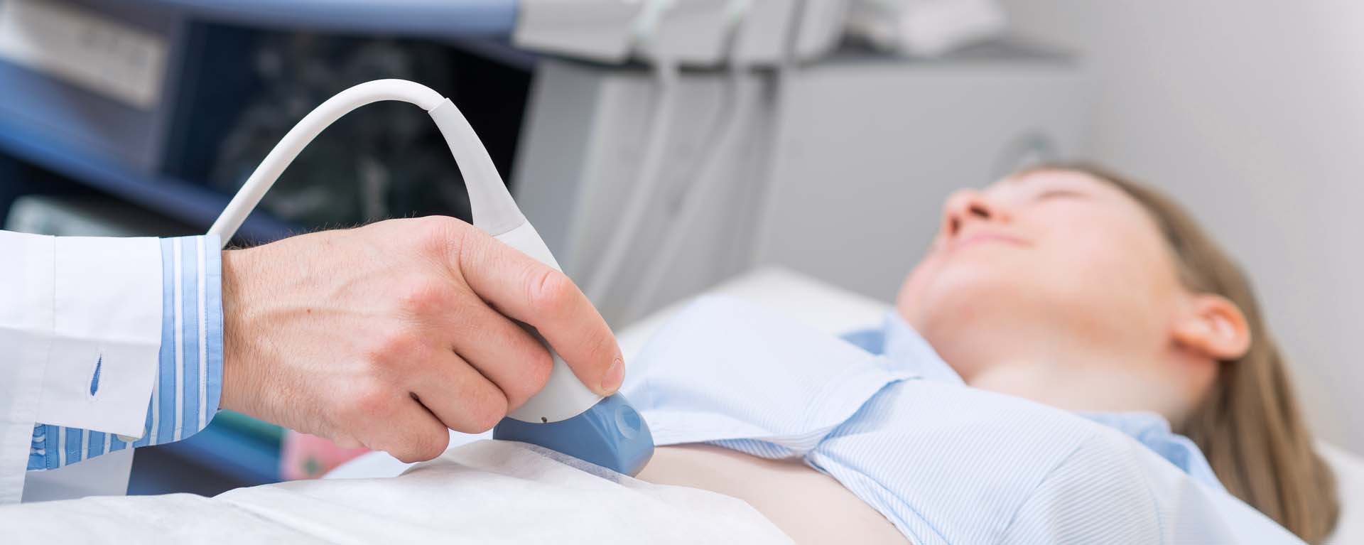 sonographer with female patient