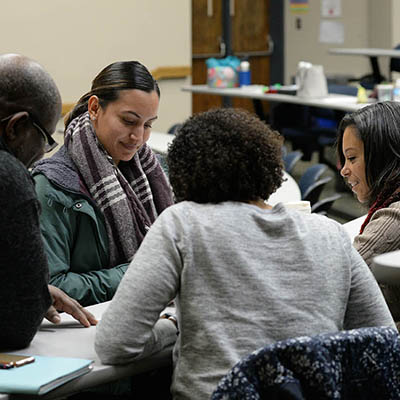 family seated in discussion