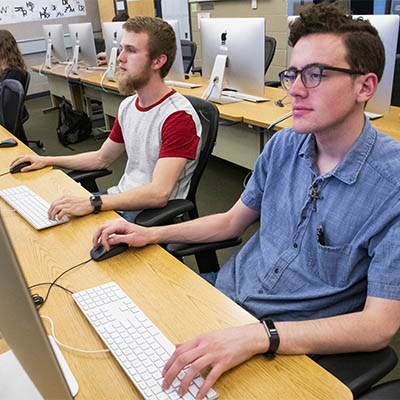 Students work on animation while sitting at computers.