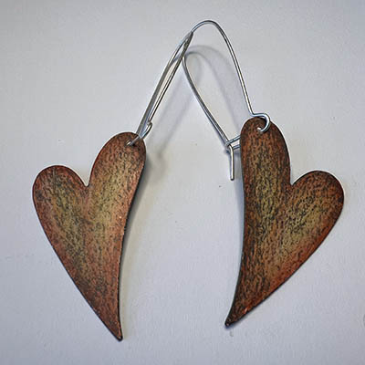An example of copper earrings that can be created in one of the workshops.