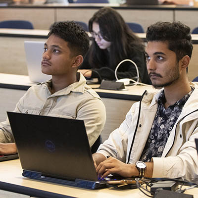 Students take notes while in class.