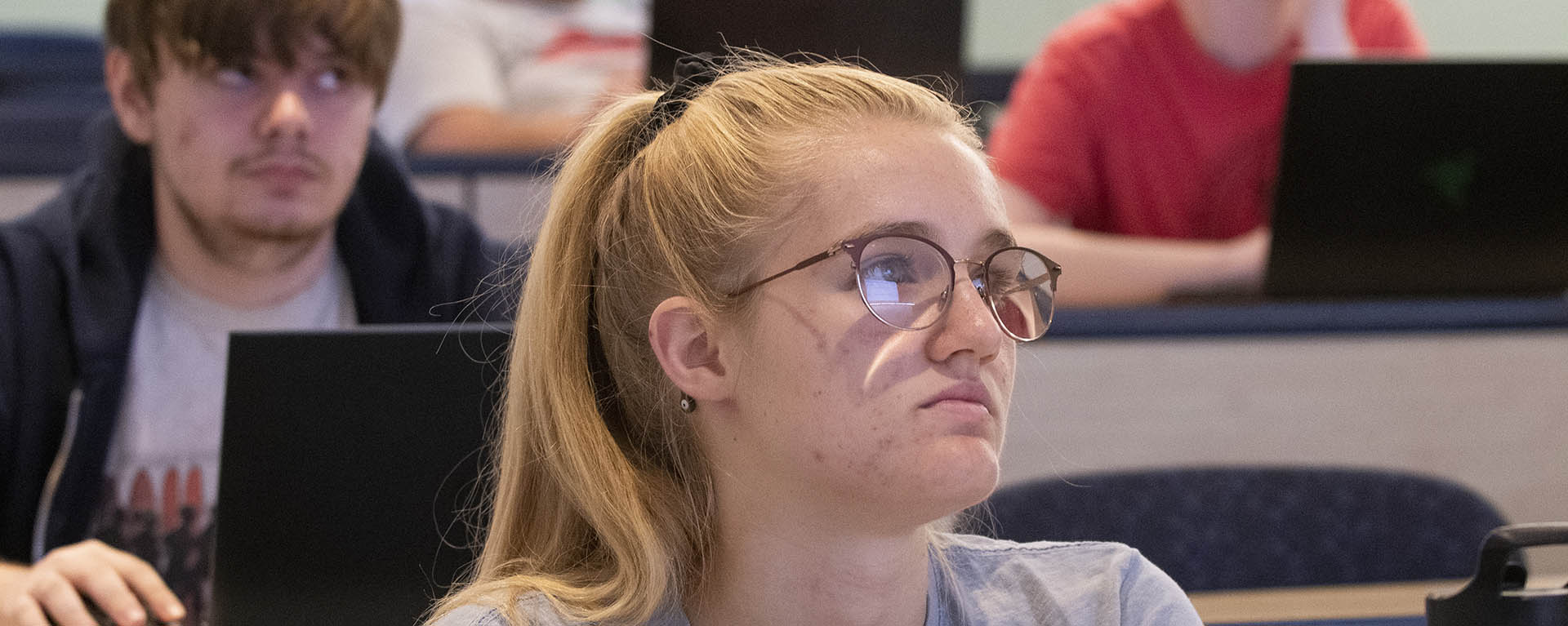 A student pays attention during class.