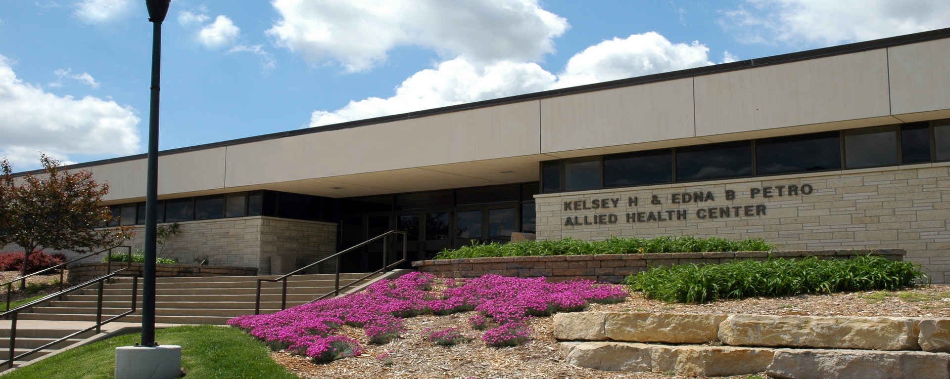 Outside the Petro Allied Health Center in spring