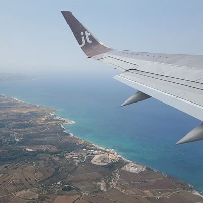 looking out the window of an airplan in flight