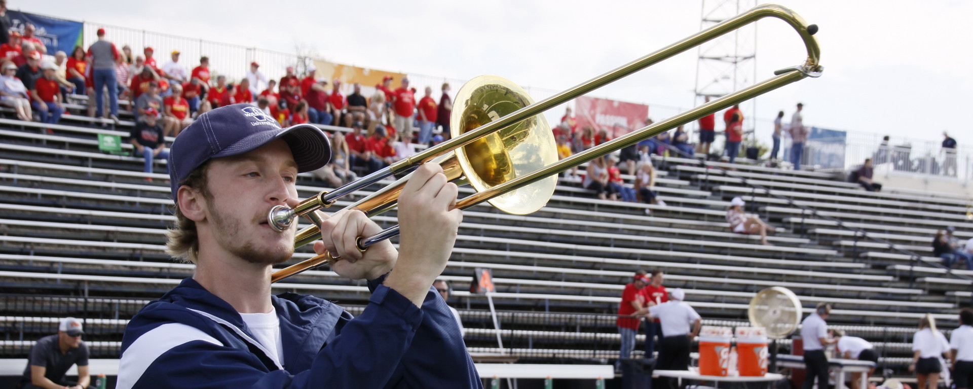 young man playing trombone
