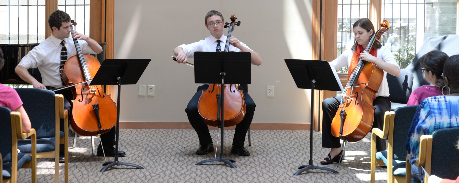 Cello ensemble playing in Carole Chapel