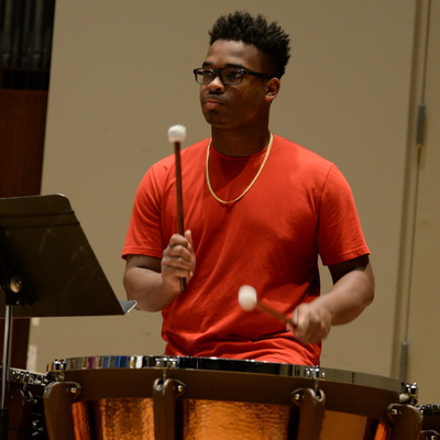 student drumming