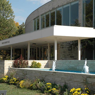 White Concert Hall exterior with fountains