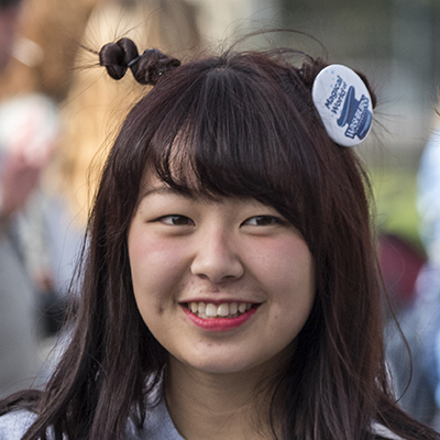 A Washburn student smiles while participating in Homecoming on campus.