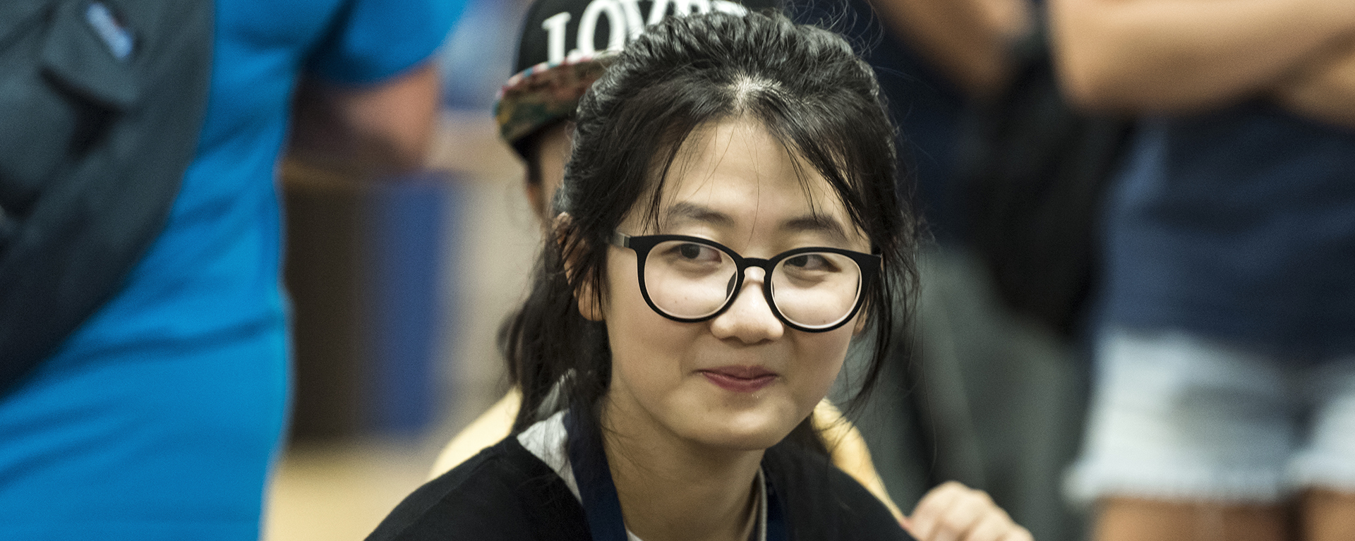 A Washburn international student listens to a question during a trivia competition at Mabee Library.