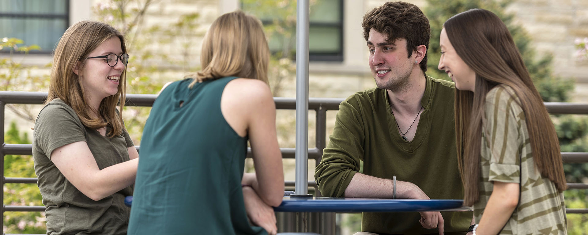 Washburn students converse on the patio of the Memorial Union.