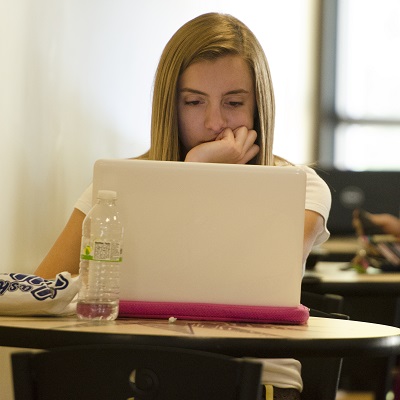 Student looking at computer