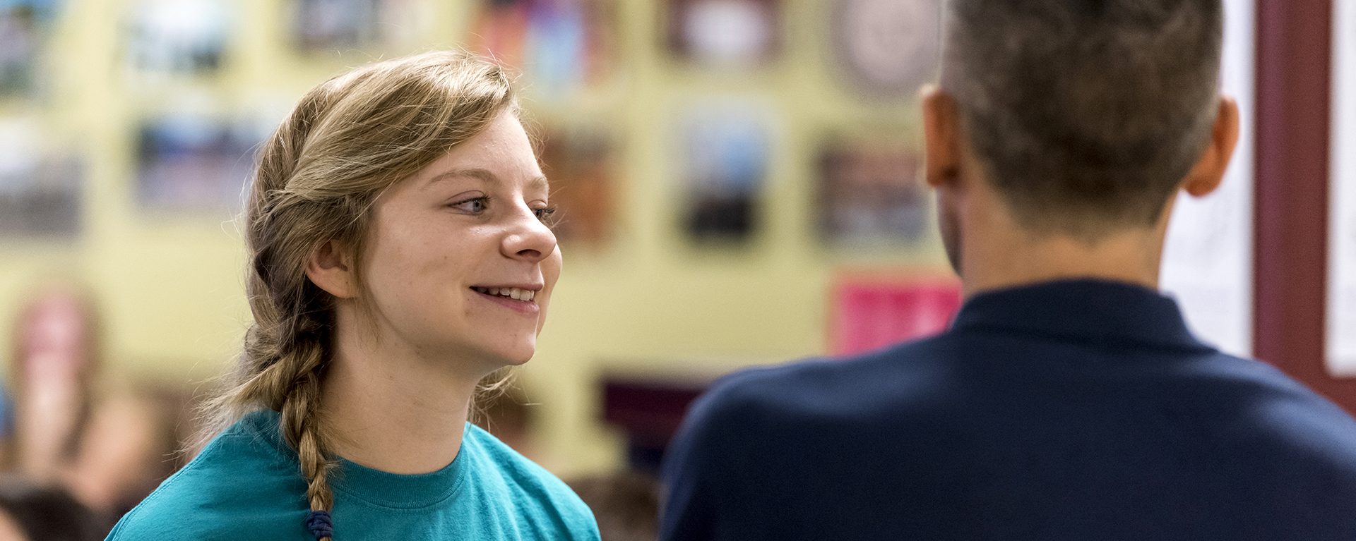 A Washburn student laughs during a Meet in Greet event at Mabee Library.