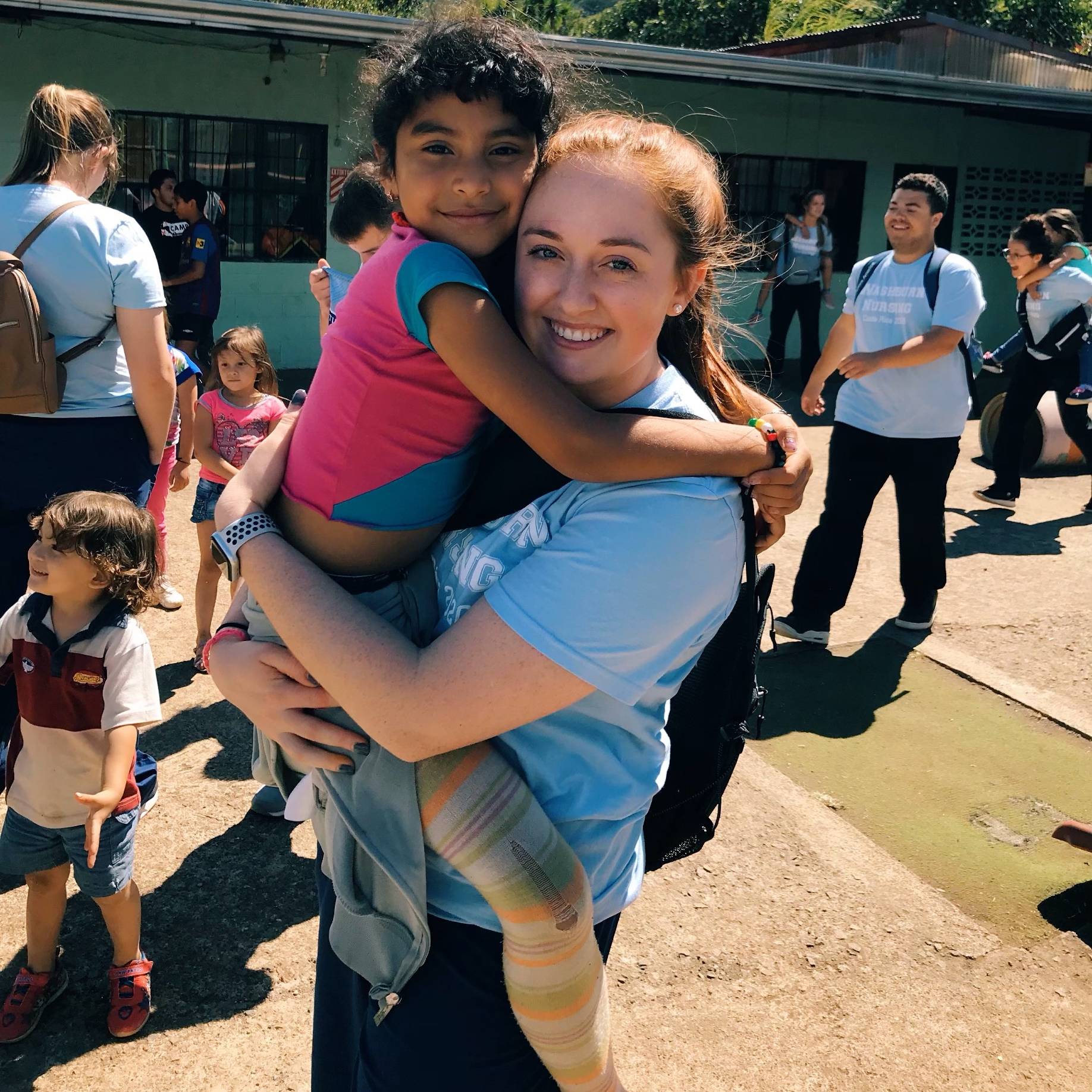 student with child at international location