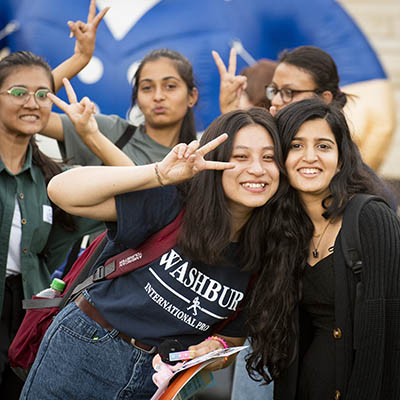 Two international students from Nepal smile for a photo.