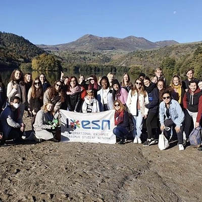 Group of students pose with a ESN sign