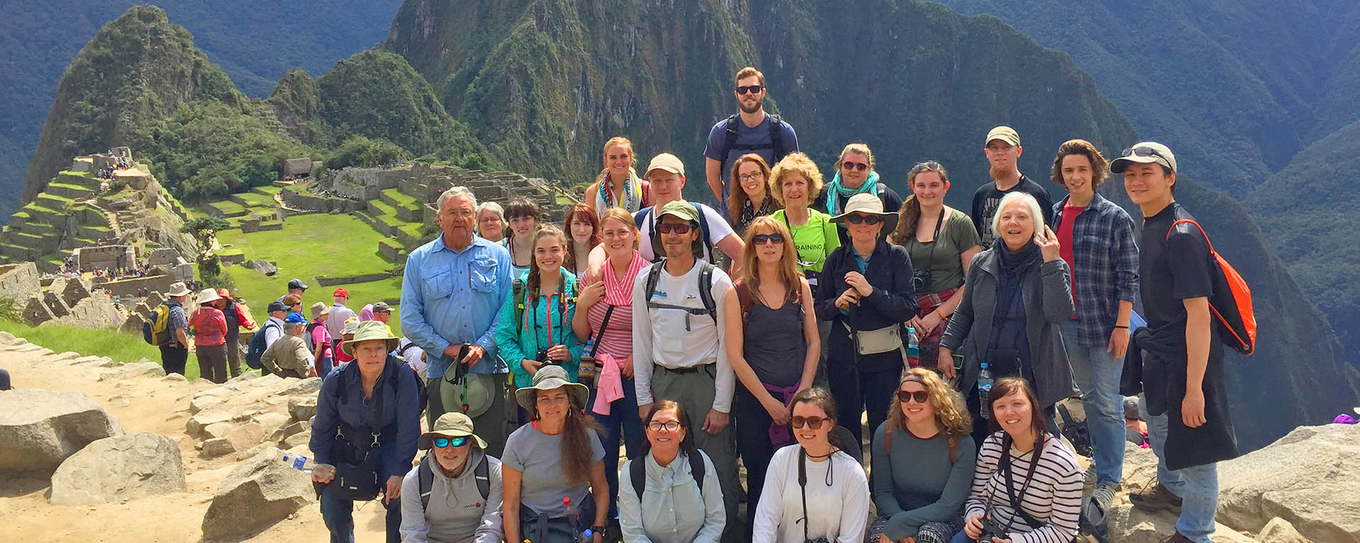 group photo of students and faculty at international mountain location