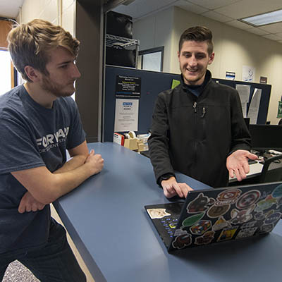 A student gets help at the ITS Help Desk.