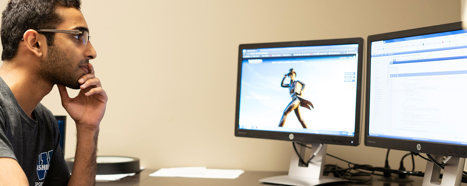 student sitting at a computer