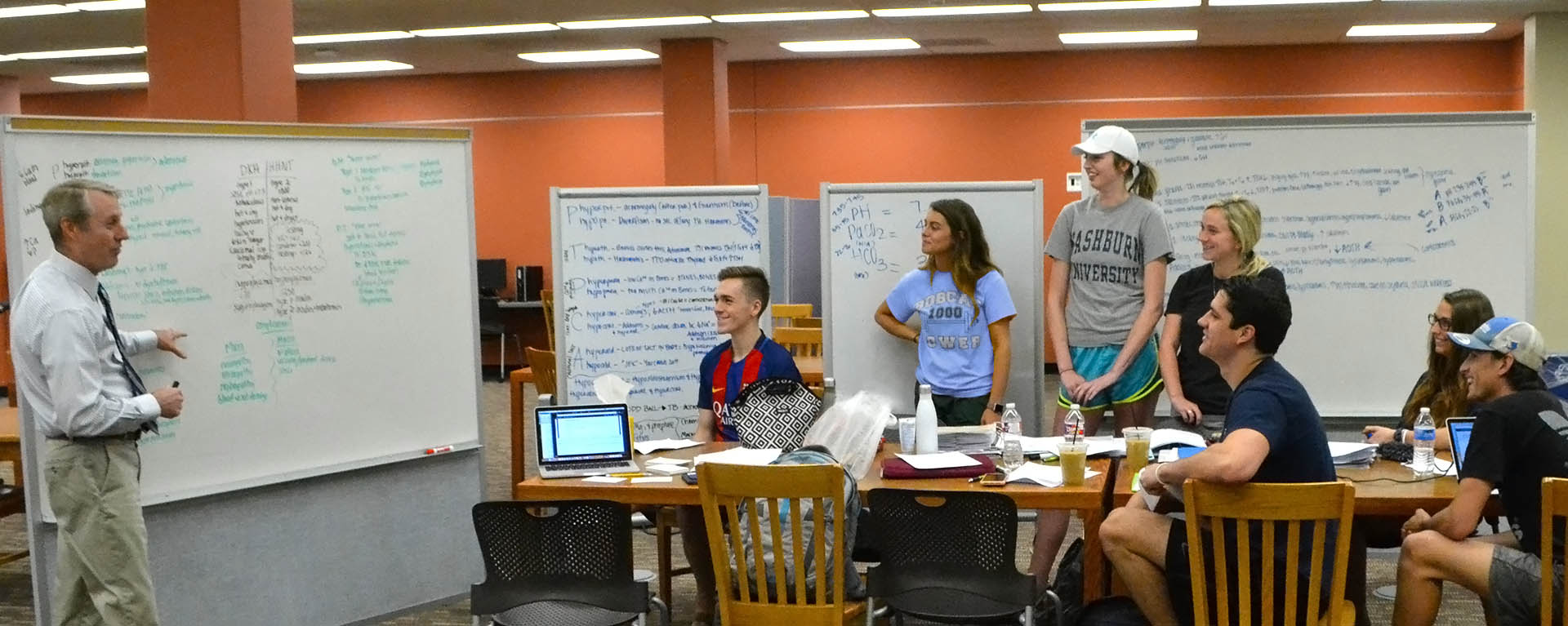 Librarian Sean Bird with students