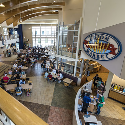 Students share lunch during a busy afternoon in the Union Market at Washburn.