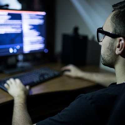 student sitting at computer