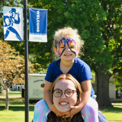 Child with Face Paint at Family Weekend