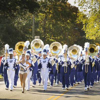 Washburn marching band marching in parade