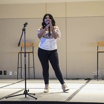 A student performs during the Rising Star homecoming event.